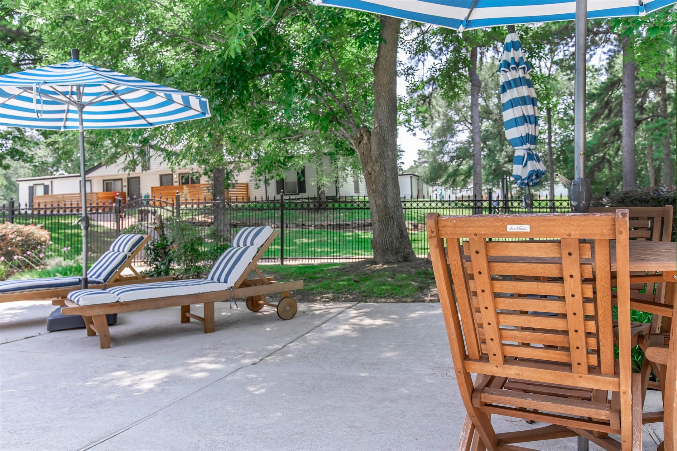 18001 Cypress Trace Road, Unit 607 Houston, TX 77090 - Photo 20 of 32 an outdoor space with swimming pool and furniture