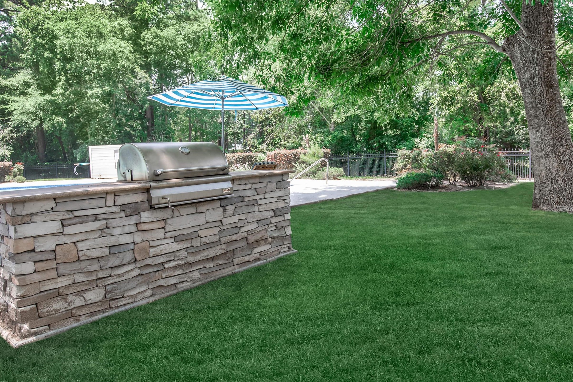 18001 Cypress Trace Road, Unit 607 Houston, TX 77090 - Photo 23 of 32 a view of garden with plants