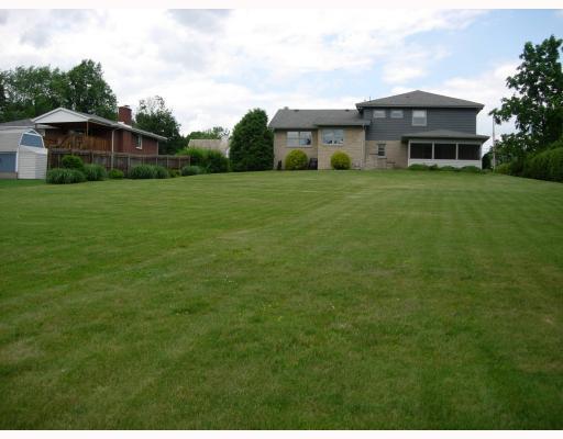 131 Pine Road Pittsburgh, PA 15237 - Photo 2 of 18 Exterior Back. Huge lot in back. Sunroom overlooks back yard. Room enough for playset, pool, etc.