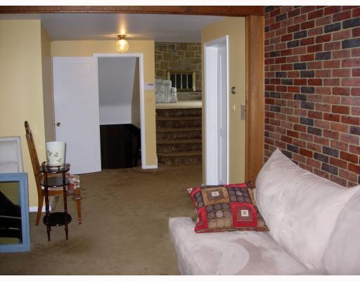 131 Pine Road Pittsburgh, PA 15237 - Photo 10 of 18 Den/Family/Great Room. View from Family Room looking past entryway to living room Great wrought iron railings.