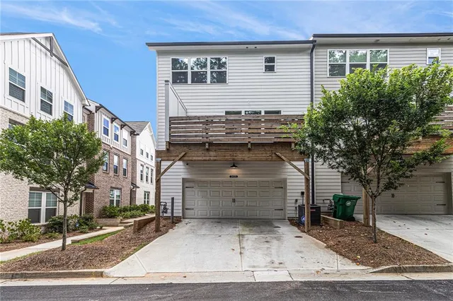 a view of a house with a street