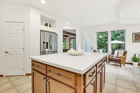 a bathroom with a sink and a large mirror