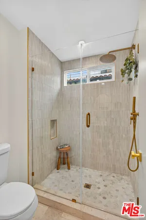 a bathroom with a sink and a shower