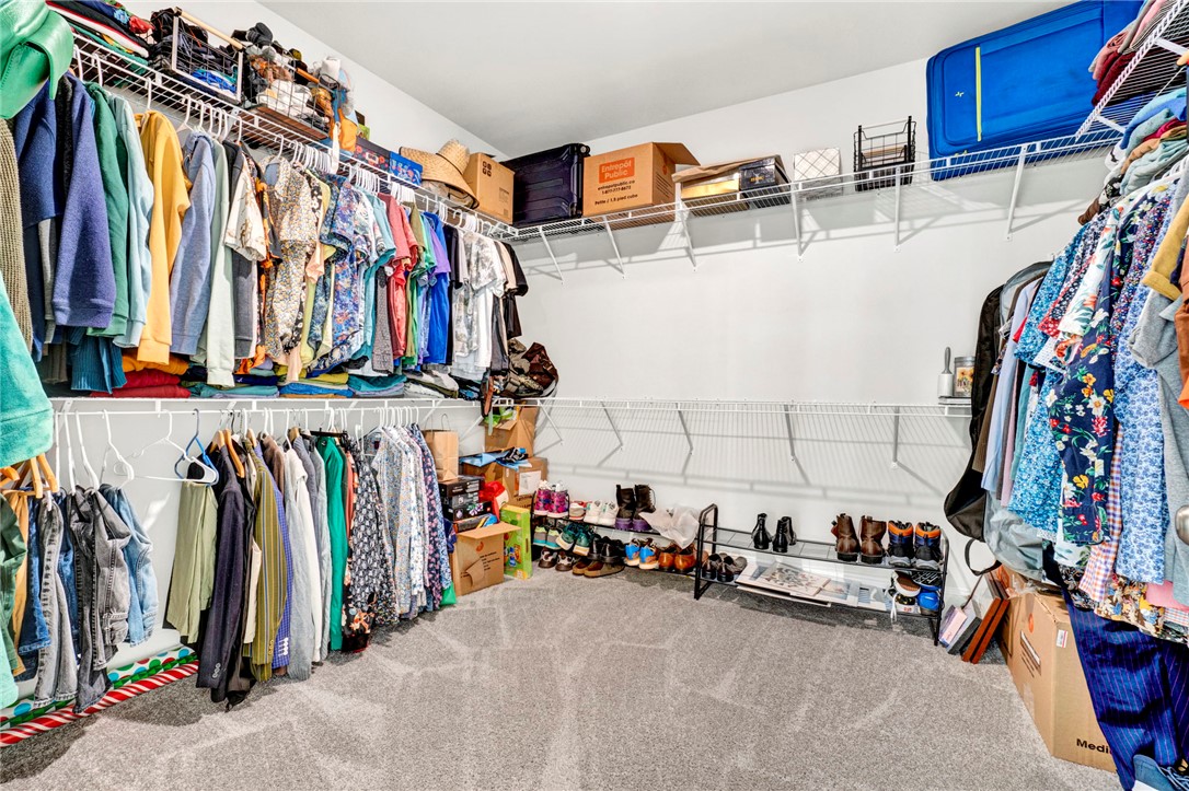 142 Juniper Hill Drive Easley, SC 29642 - Photo 31 of 47 This spacious walk-in closet offers extensive shelving and hanging space, keeping everything neatly organized.