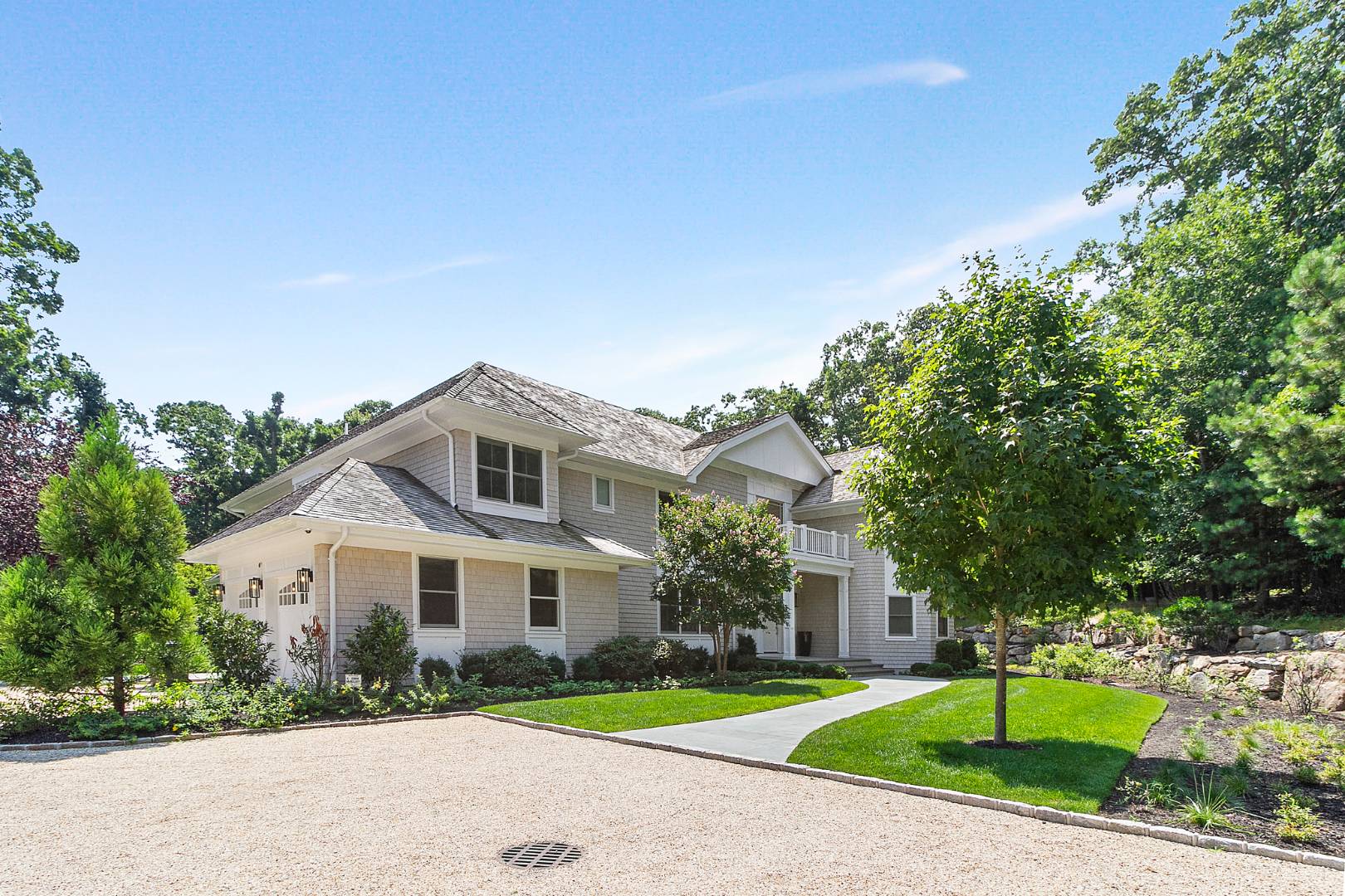 8 Shady Pth Bridgehampton, NY 11963 - Photo 2 of 30 a front view of a house with a yard