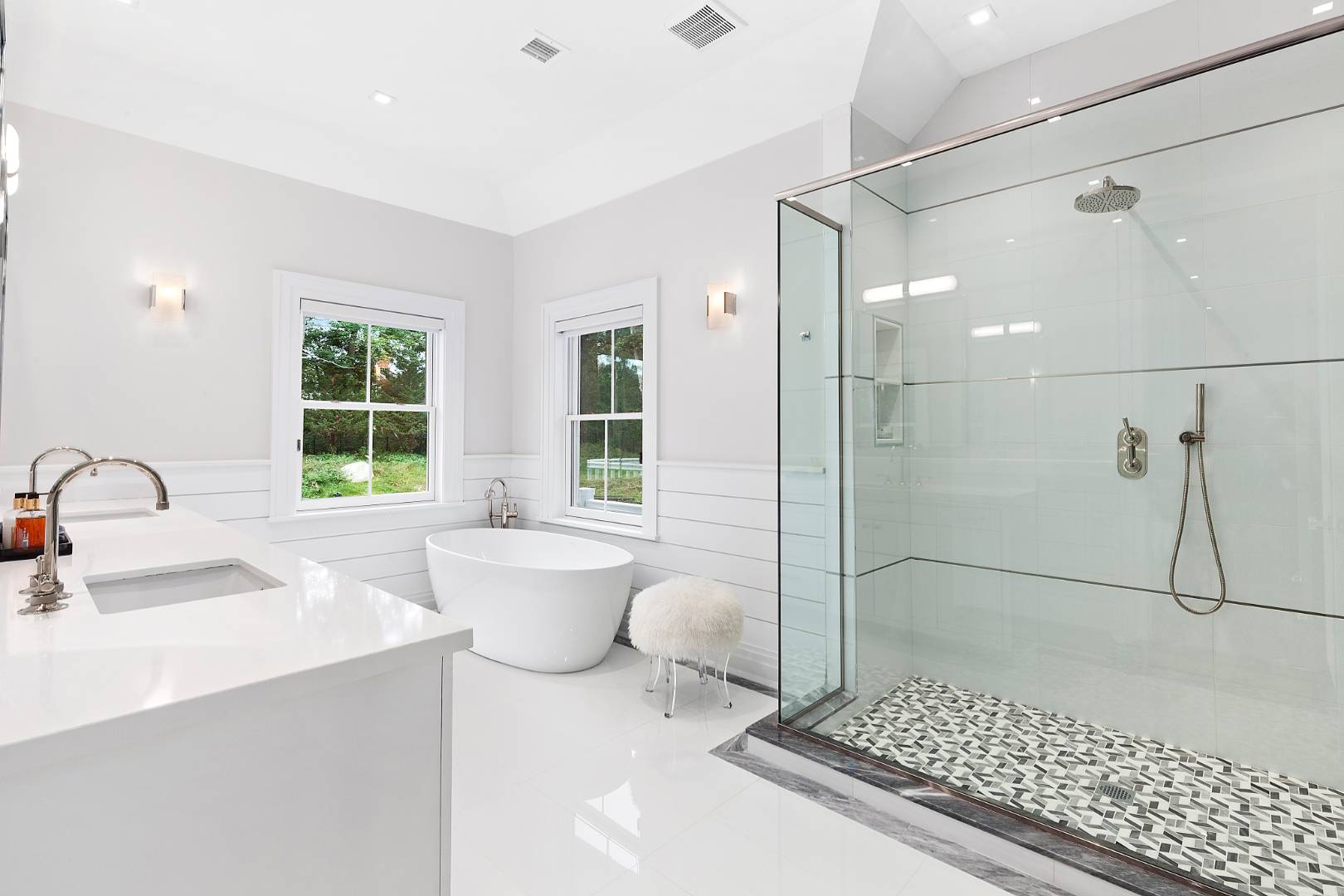 8 Shady Pth Bridgehampton, NY 11963 - Photo 18 of 30 a bathroom with a sink a toilet and shower