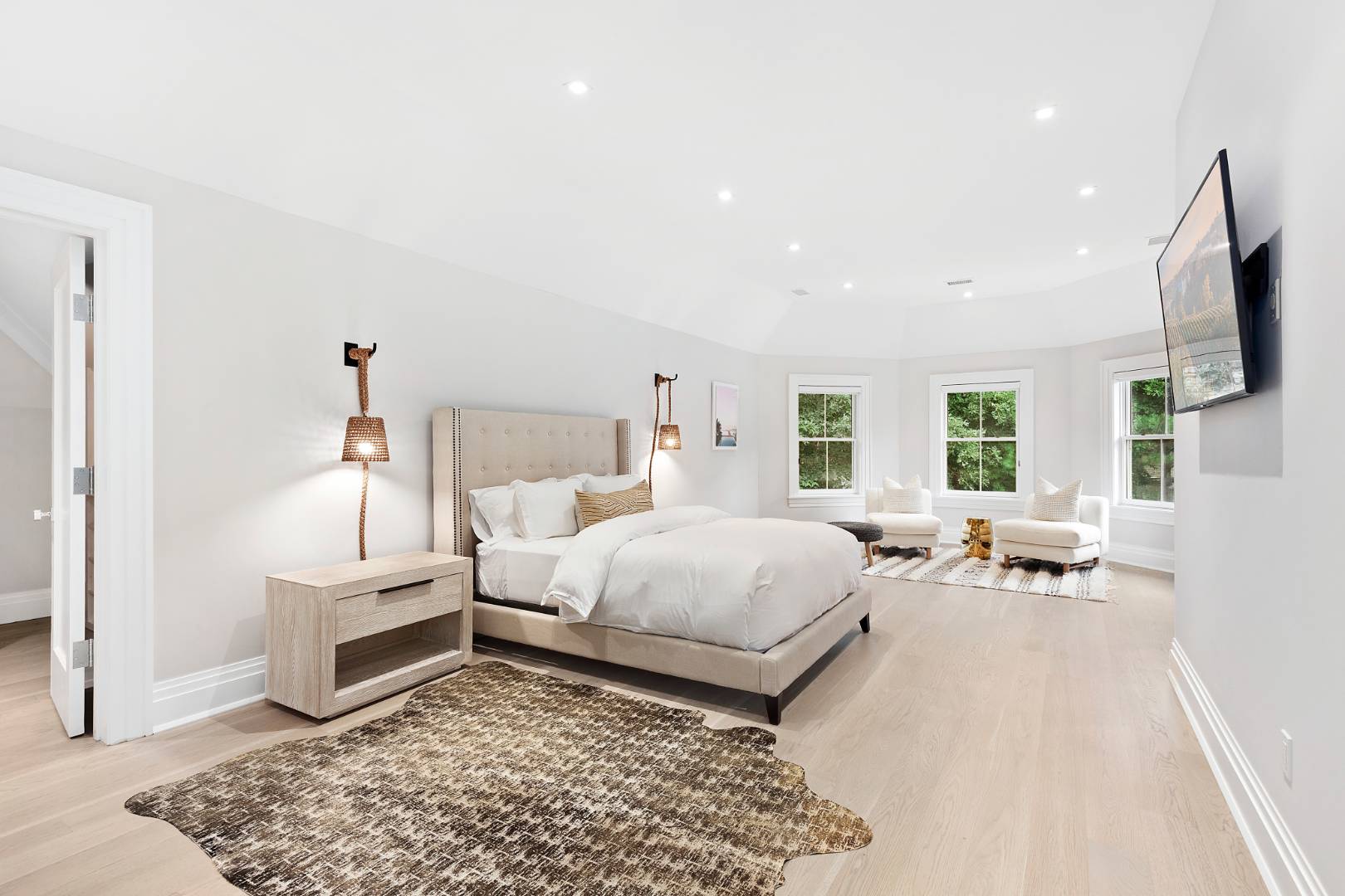 8 Shady Pth Bridgehampton, NY 11963 - Photo 19 of 30 a bed room with a bed window and a television