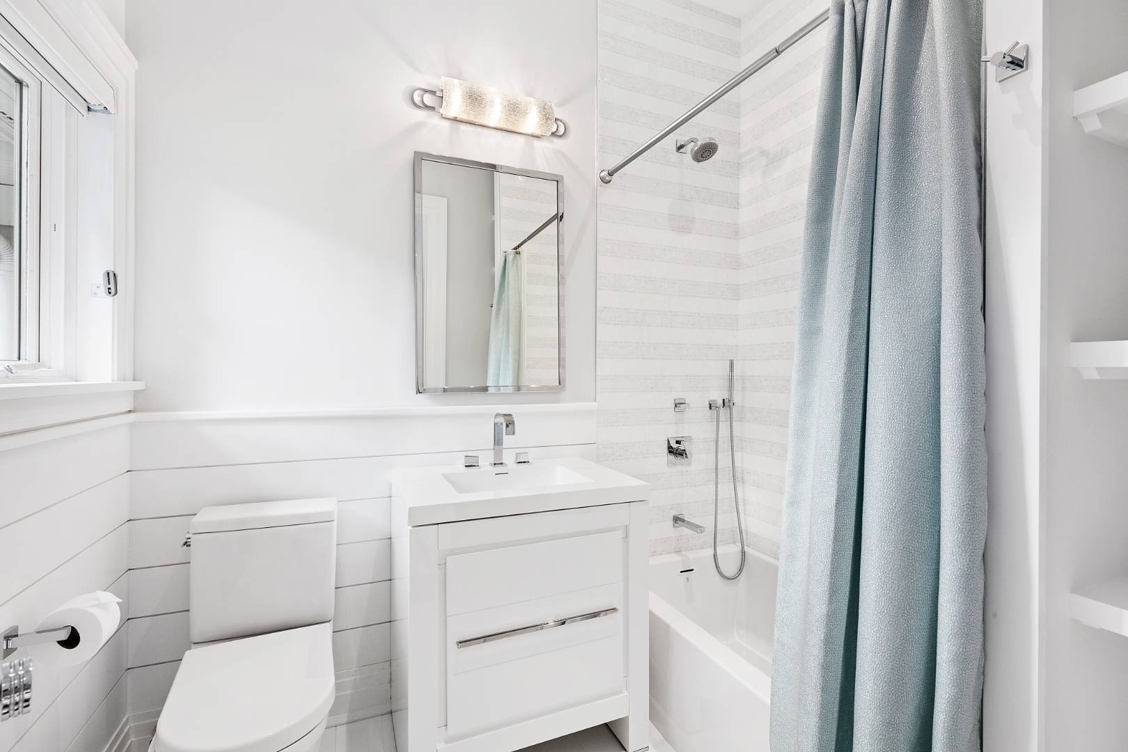 8 Shady Pth Bridgehampton, NY 11963 - Photo 22 of 30 a bathroom with a toilet sink vanity and shower