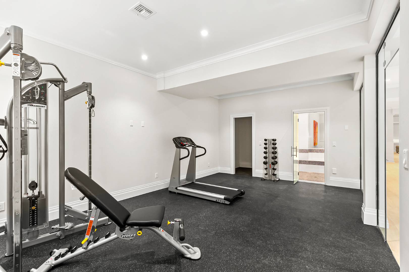 8 Shady Pth Bridgehampton, NY 11963 - Photo 29 of 30 a room with gym equipment and a table