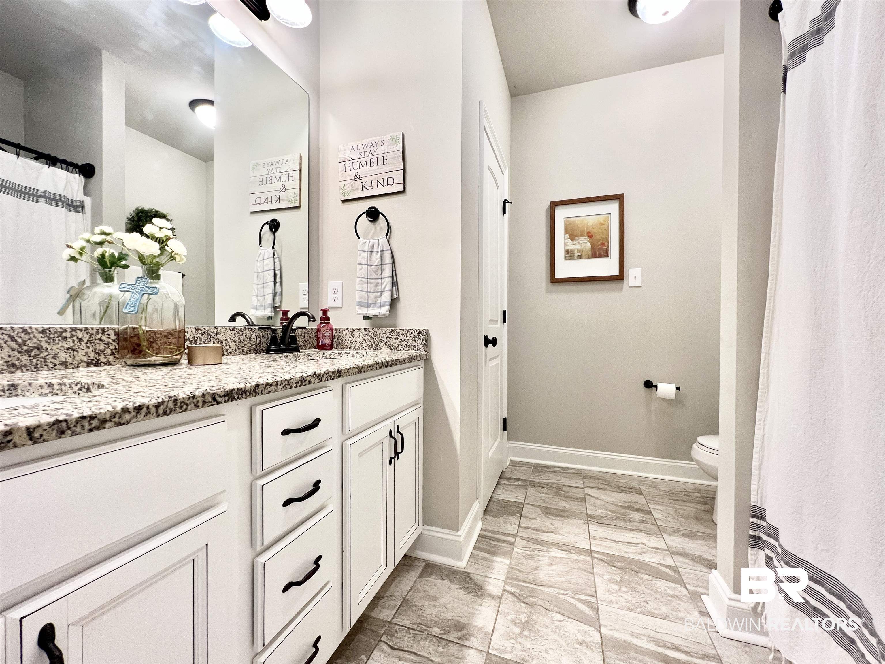 32290 Calder Court Daphne, AL 36527 - Photo 30 of 59 Bathroom with vanity and toilet