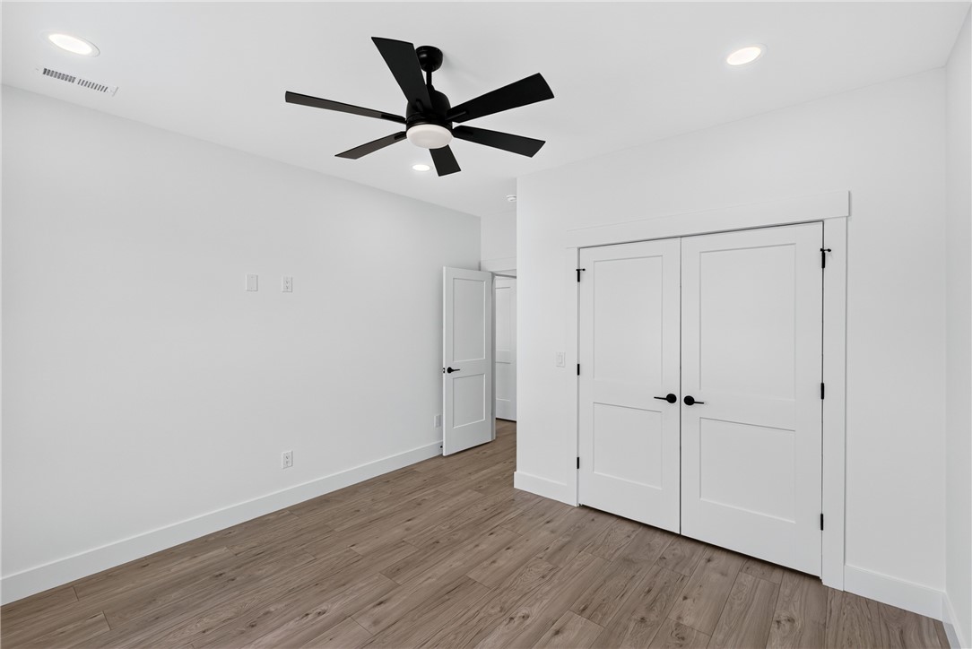 416 Blume Road Anderson, SC 29625 - Photo 15 of 29 Natural light cascades upon the wide plank flooring, enhancing this serene space.