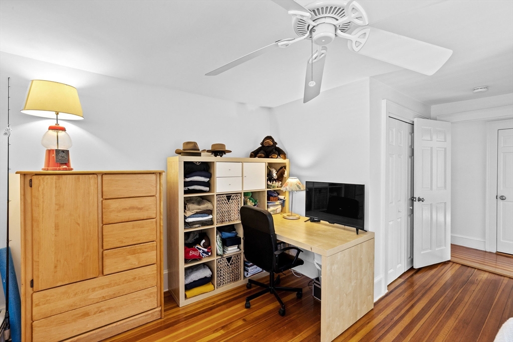 59 Gannett Road Scituate, MA 02066 - Photo 25 of 40 a view of a workspace with furniture and wooden floor