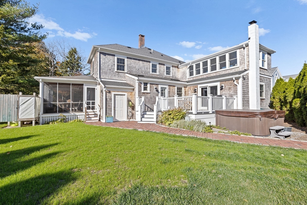 59 Gannett Road Scituate, MA 02066 - Photo 27 of 40 a front view of a house with a yard