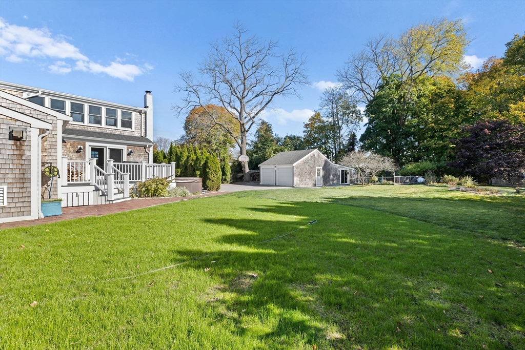 59 Gannett Road Scituate, MA 02066 - Photo 30 of 40 a view of a house with a big yard