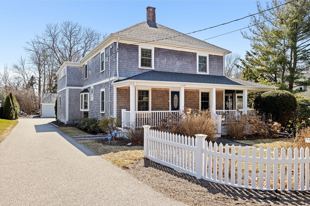 59 Gannett Road Scituate, MA 02066 - Photo 31 of 40 a front view of a house with a yard