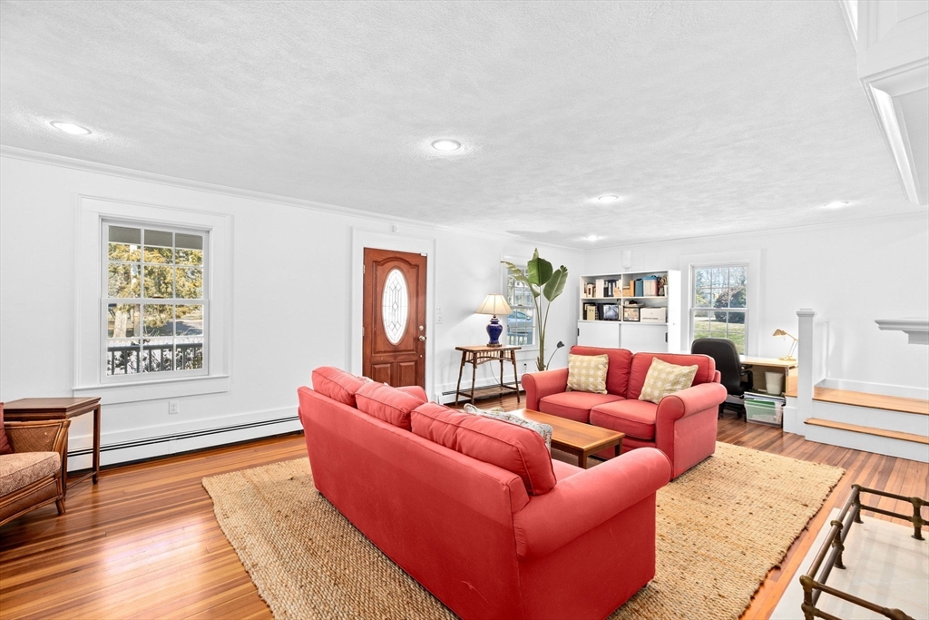 59 Gannett Road Scituate, MA 02066 - Photo 6 of 40 a living room with furniture window and wooden floor