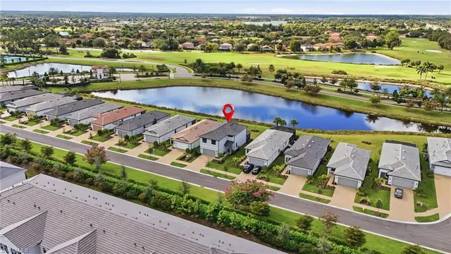 a view of swimming pool with outdoor seating and yard