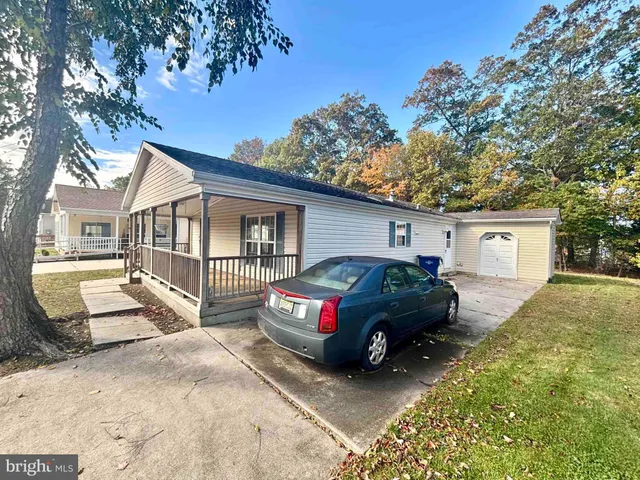 a car parked in front of a house