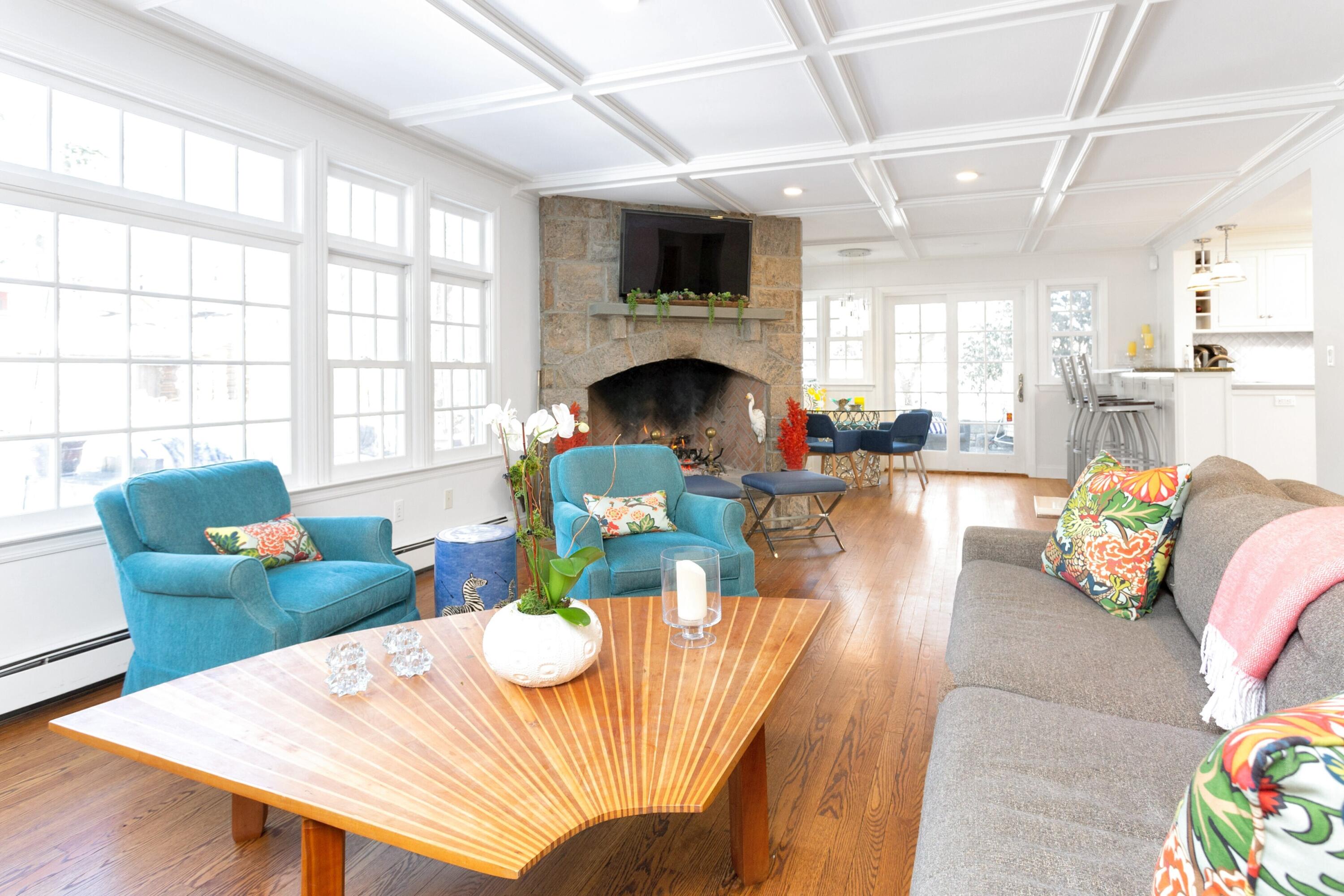 36 Sunset Road Darien, CT 06820 - Photo 14 of 38 a living room with fireplace furniture and a wooden floor