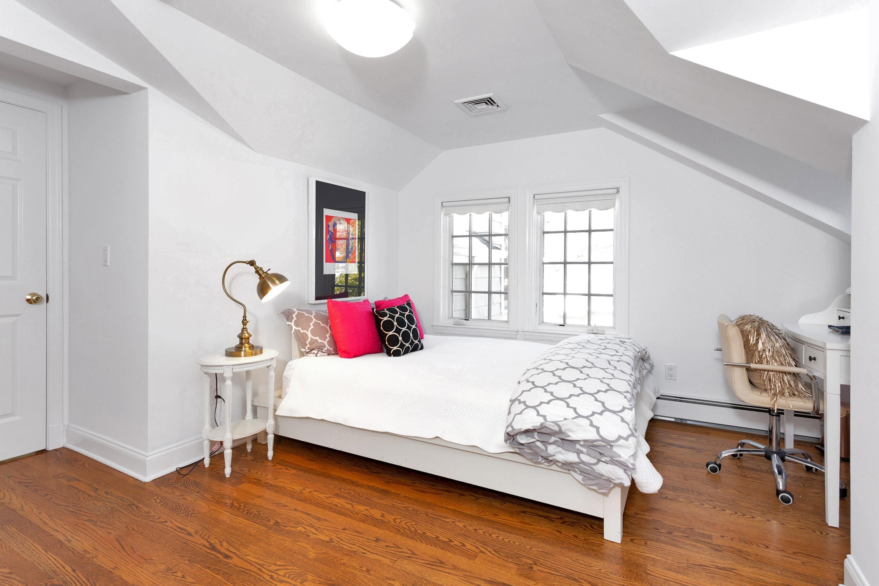 36 Sunset Road Darien, CT 06820 - Photo 20 of 38 a bedroom with a bed and a window