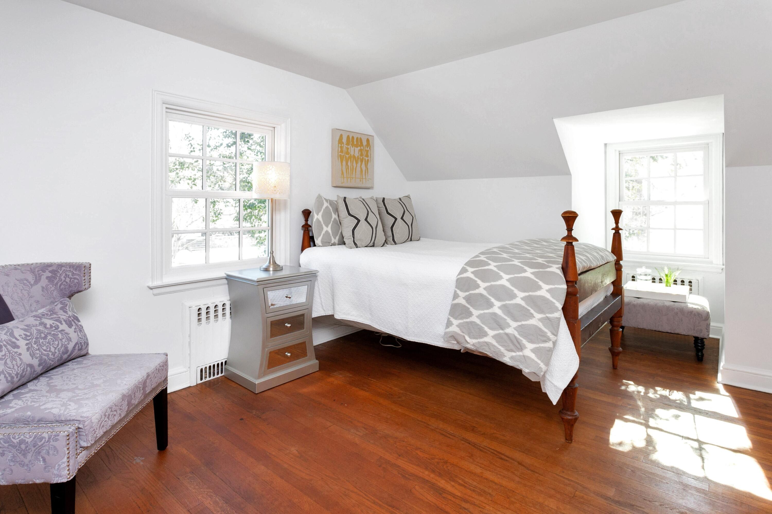 36 Sunset Road Darien, CT 06820 - Photo 24 of 38 a bedroom with a bed and a couch