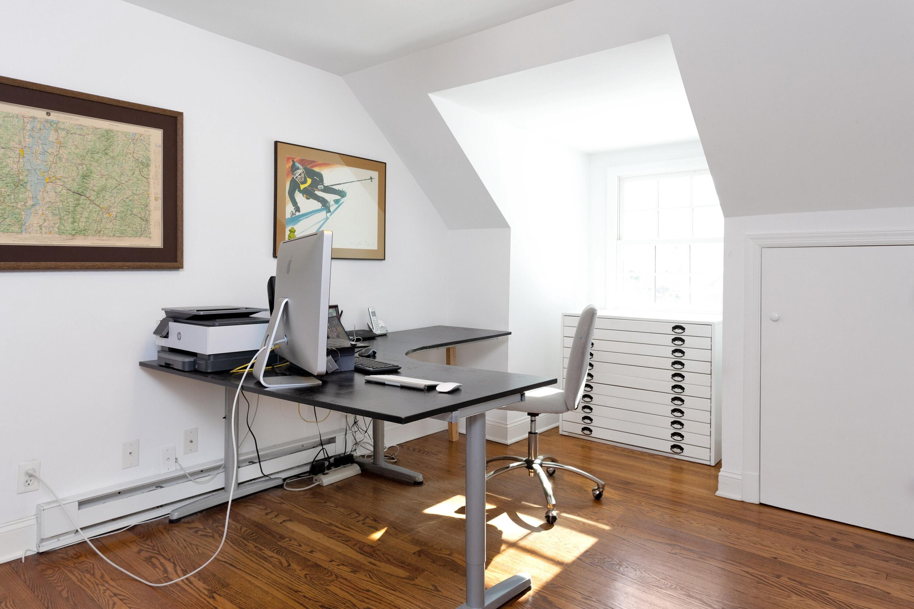 36 Sunset Road Darien, CT 06820 - Photo 27 of 38 a view of a workspace with furniture and wooden floor