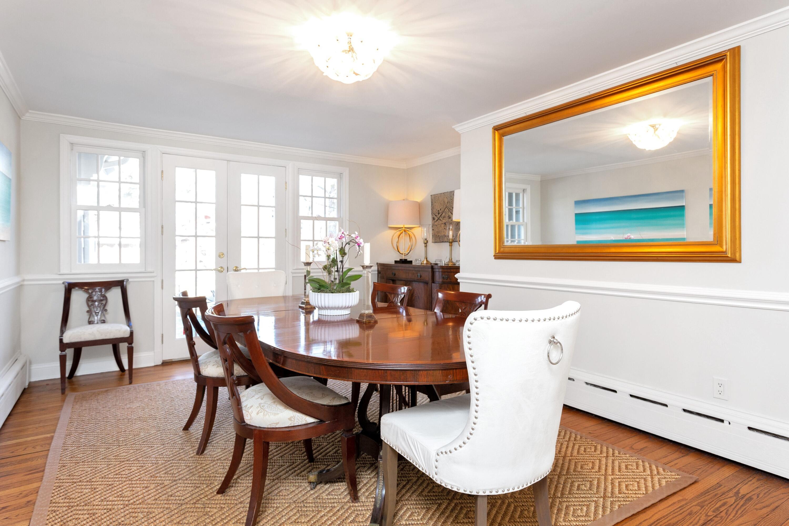 36 Sunset Road Darien, CT 06820 - Photo 5 of 38 a view of a dining room with furniture and wooden floor