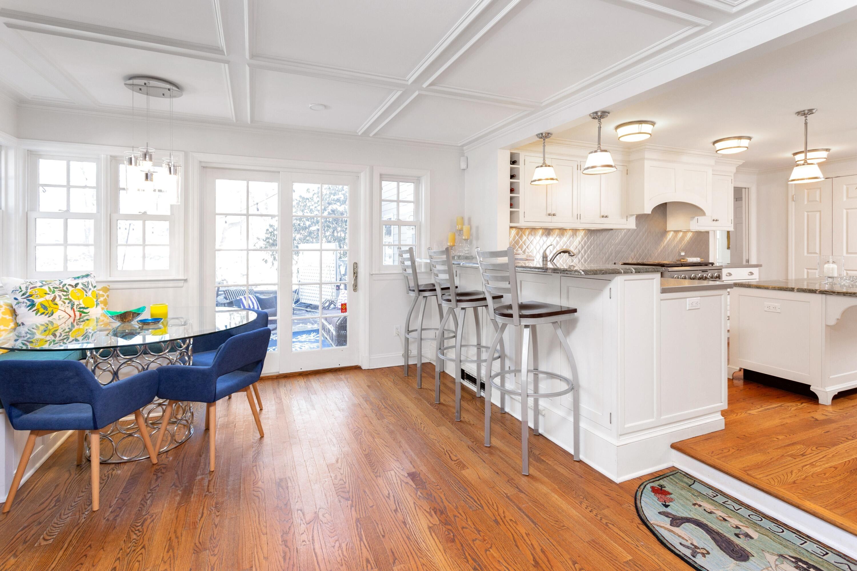 36 Sunset Road Darien, CT 06820 - Photo 7 of 38 a living room filled with furniture and a wooden floor
