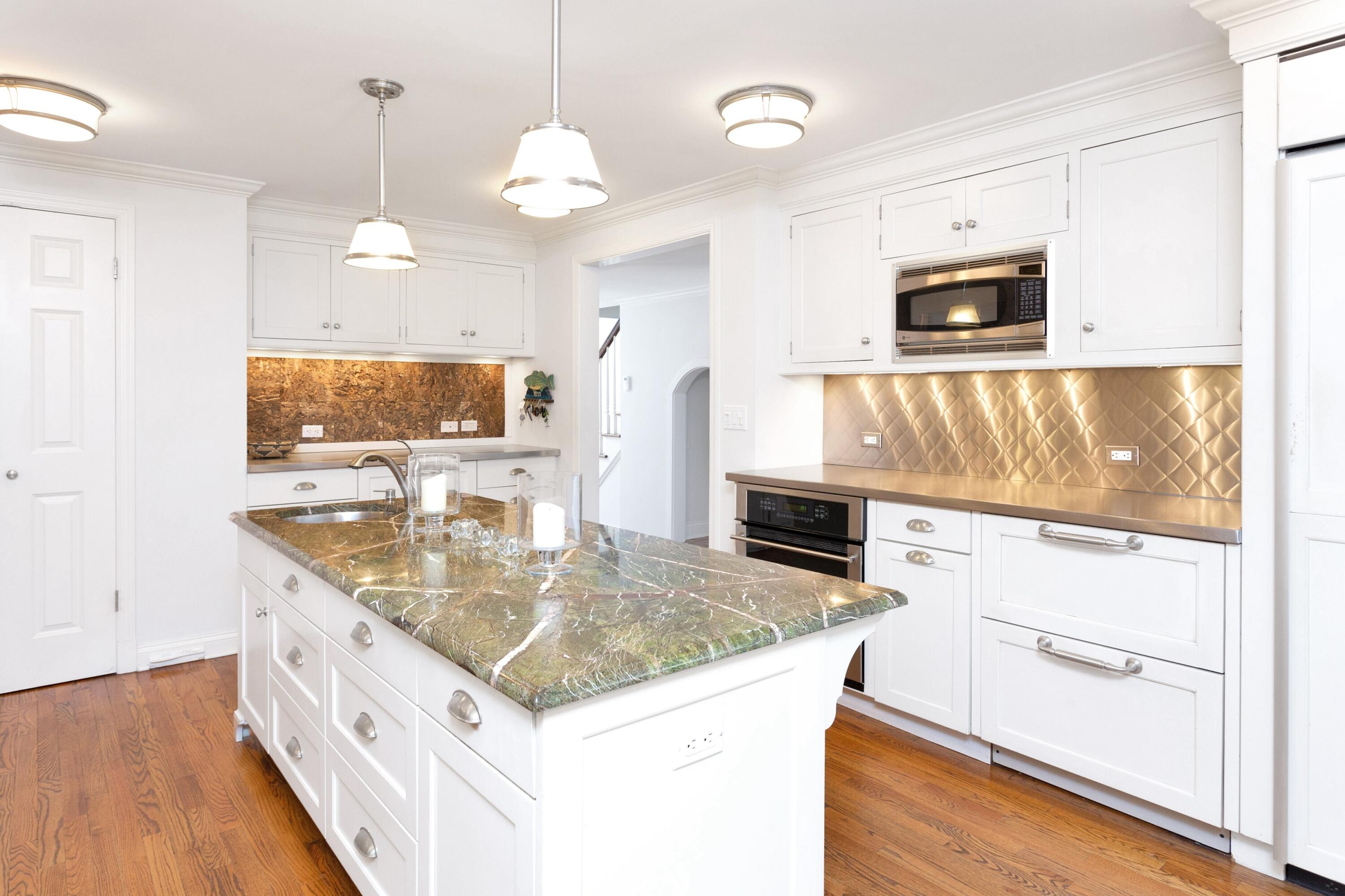 36 Sunset Road Darien, CT 06820 - Photo 10 of 38 a kitchen with stainless steel appliances granite countertop a sink a stove and a wooden floors