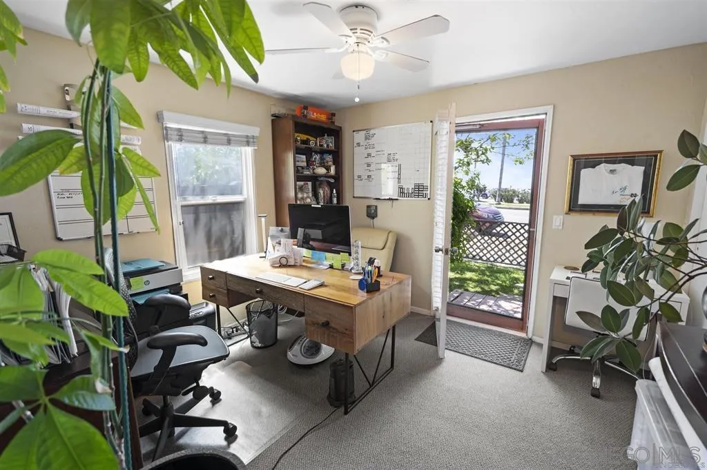 353 3rd Street Encinitas, CA 92024 - Photo 13 of 33 a view of a workspace with furniture and a window