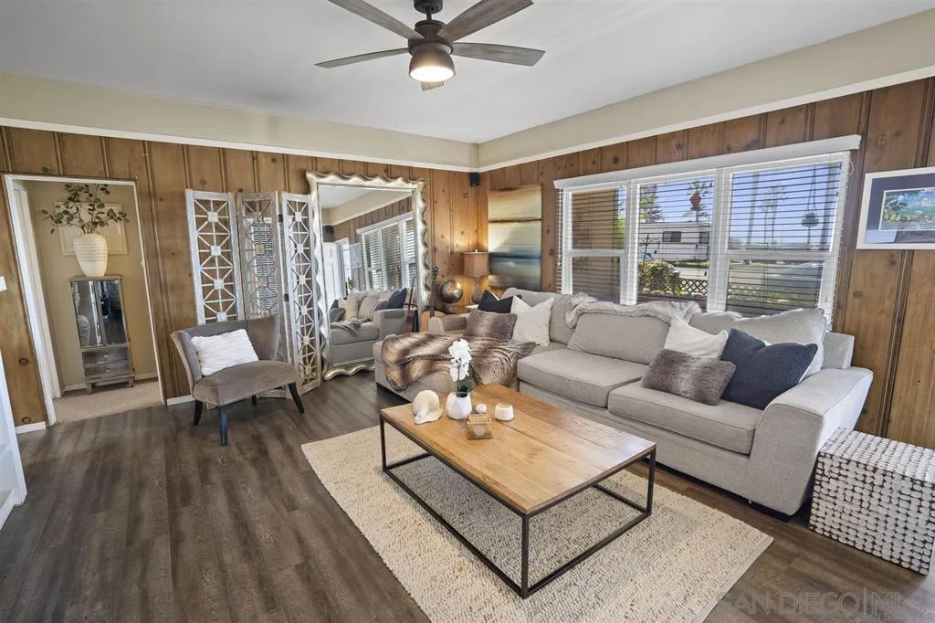 353 3rd Street Encinitas, CA 92024 - Photo 18 of 33 a living room with furniture and a large window