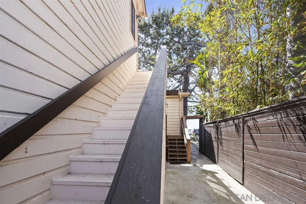 353 3rd Street Encinitas, CA 92024 - Photo 23 of 33 a balcony with trees in front of it