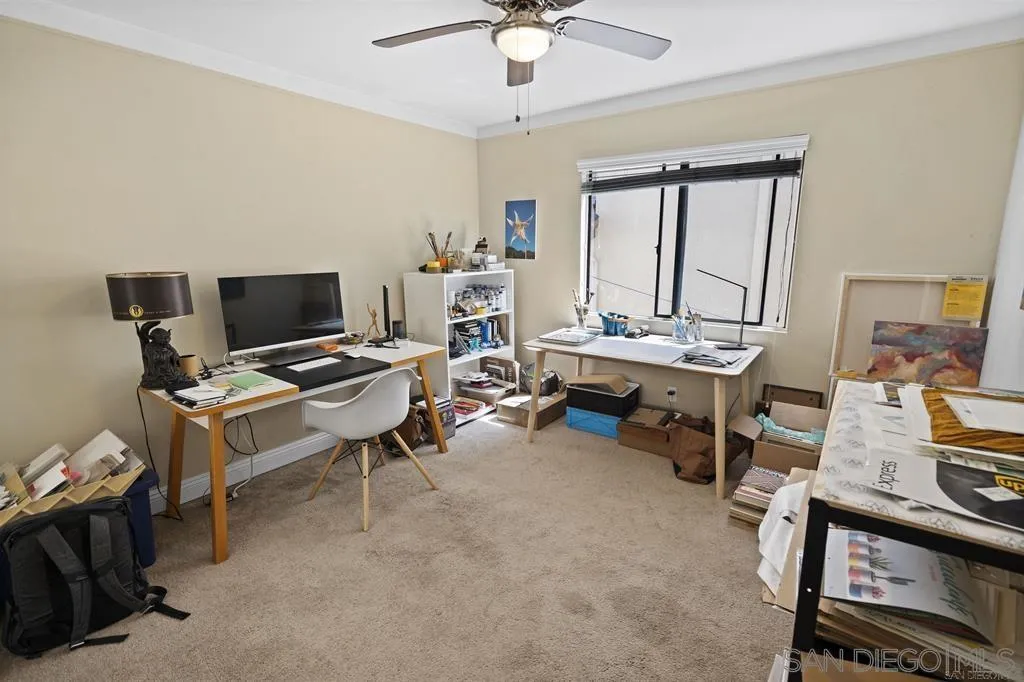 353 3rd Street Encinitas, CA 92024 - Photo 24 of 33 a view of a workspace with furniture and a window