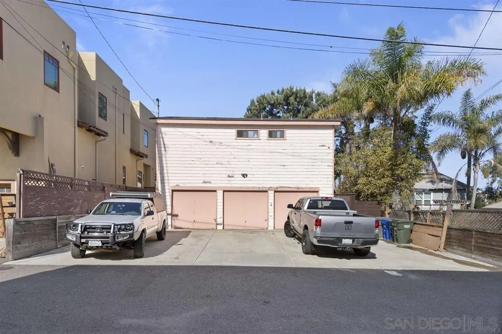 353 3rd Street Encinitas, CA 92024 - Photo 10 of 33 a car parked in front of a house