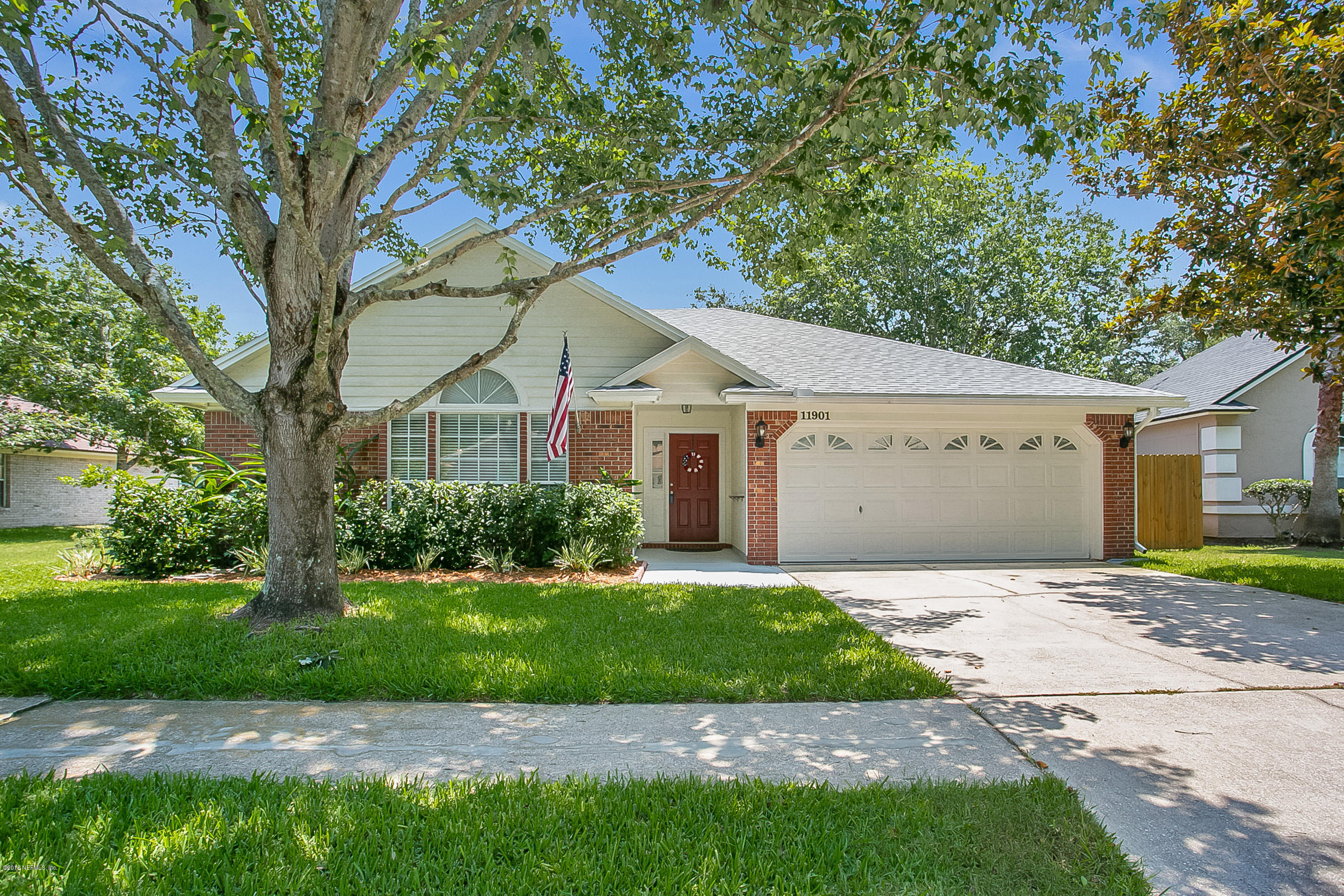 11901 Swooping Willow Road Jacksonville, FL 32223 - Photo 1 of 32 001_Front