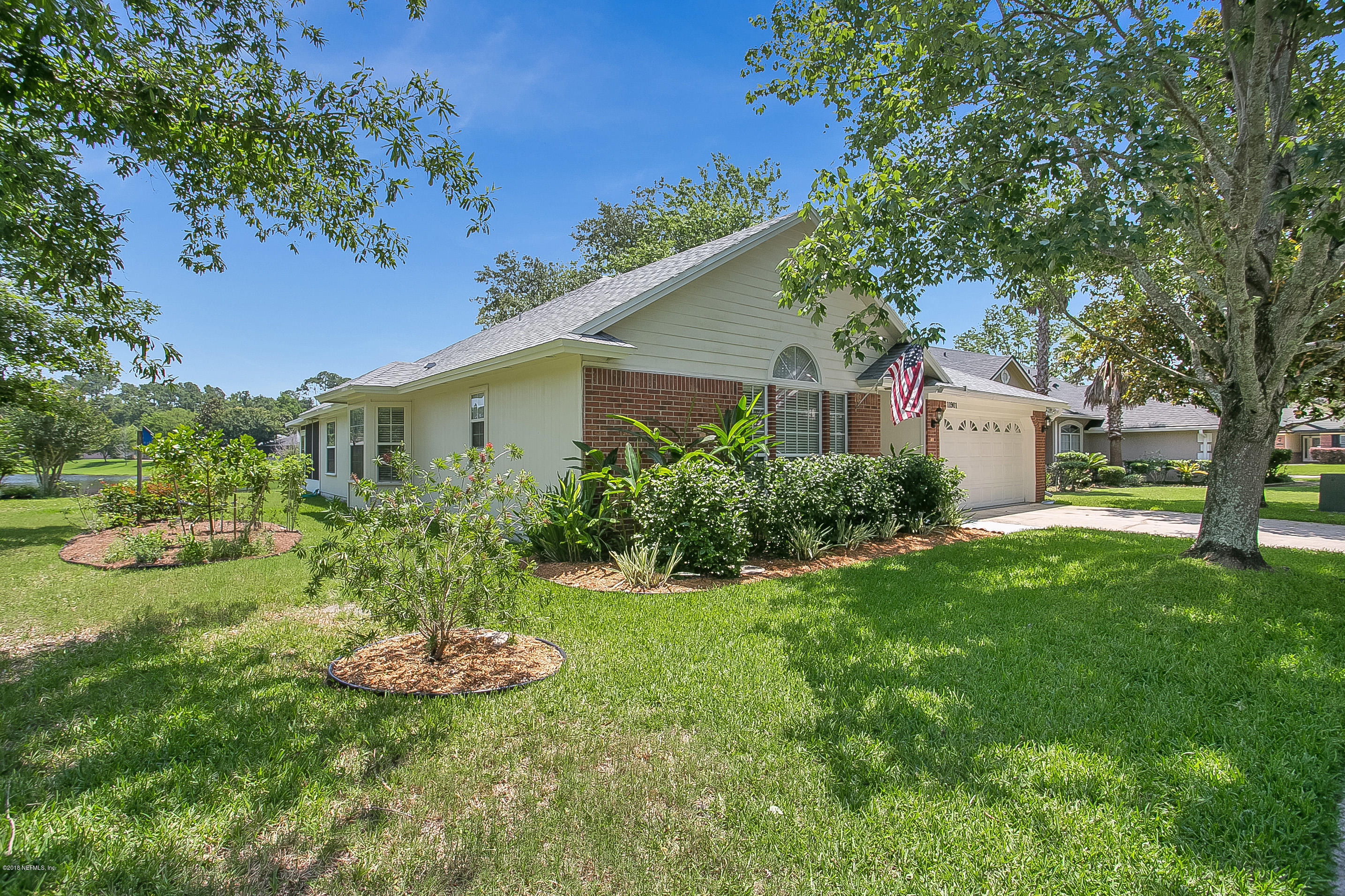 11901 Swooping Willow Road Jacksonville, FL 32223 - Photo 26 of 32 031_Front - Side Yard