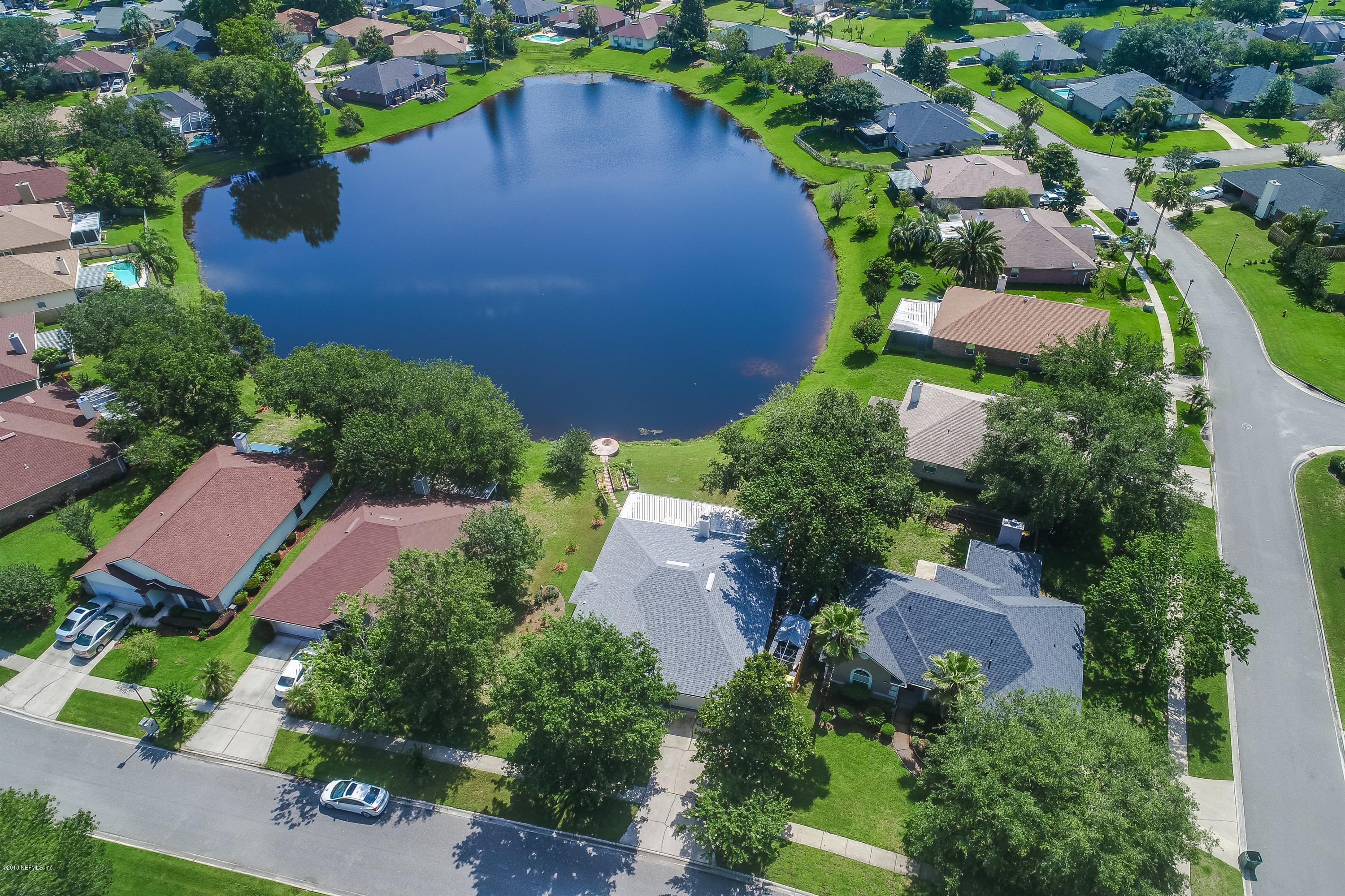 11901 Swooping Willow Road Jacksonville, FL 32223 - Photo 28 of 32 009_Front to Pond View