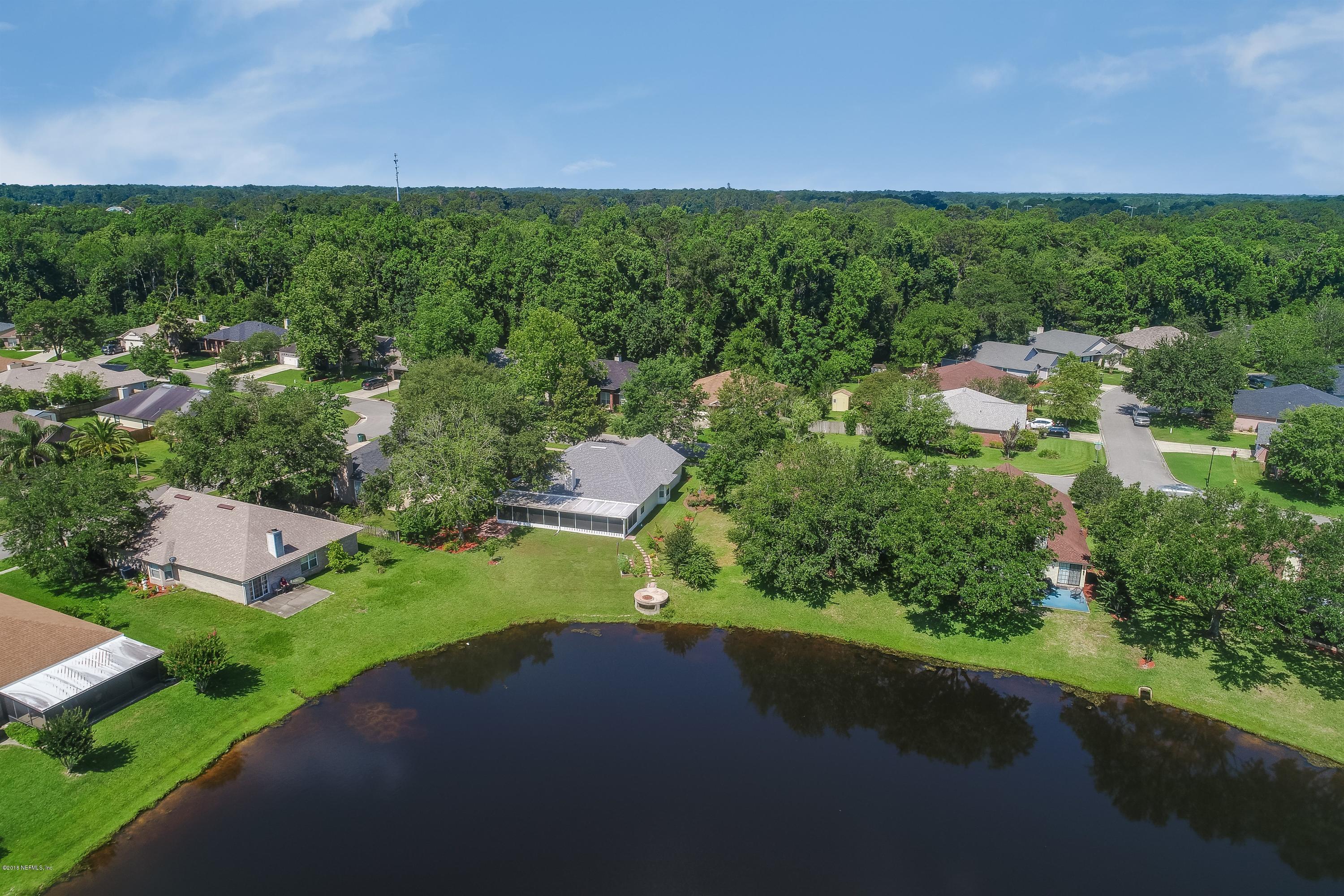 11901 Swooping Willow Road Jacksonville, FL 32223 - Photo 29 of 32 010_Pond to House