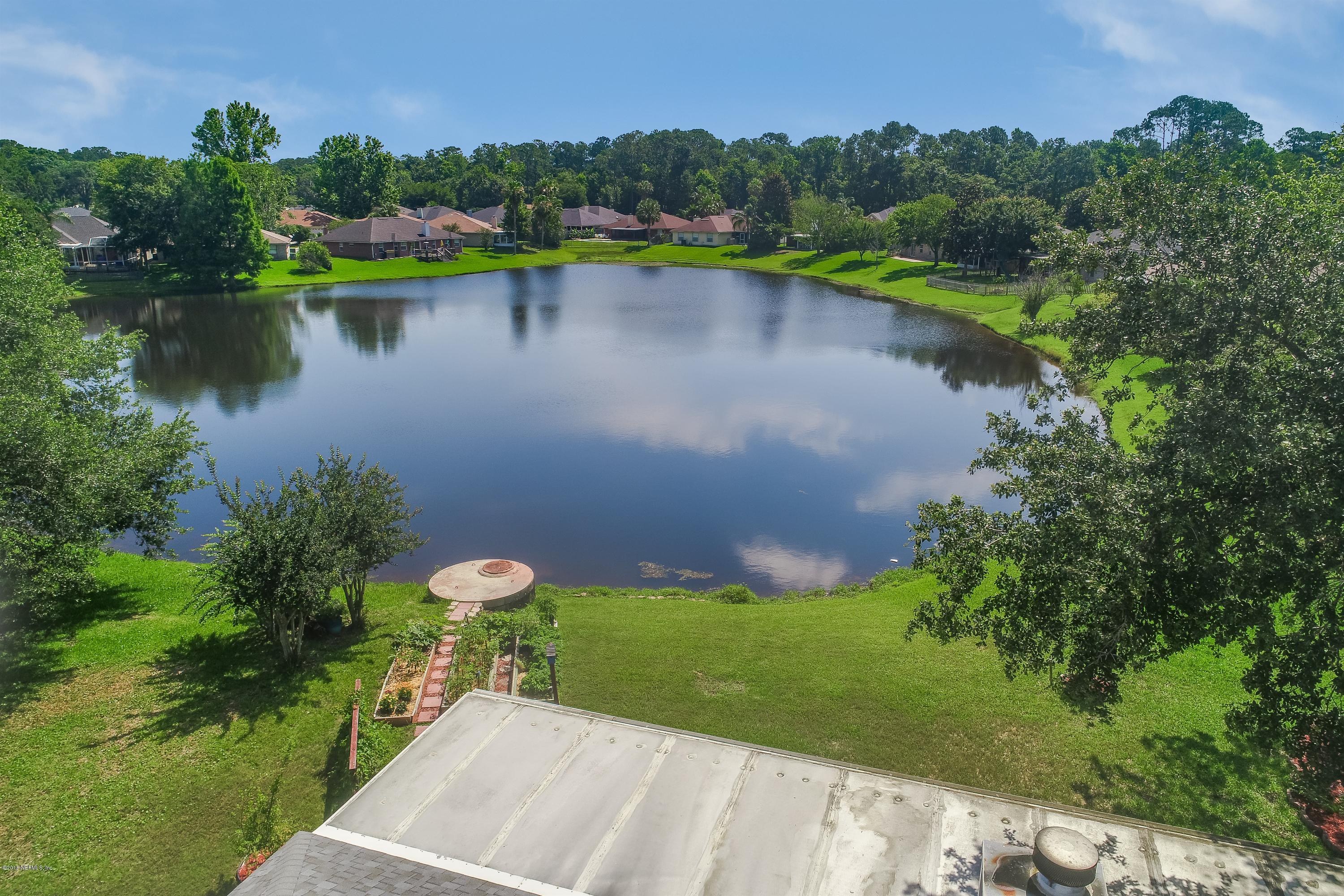 11901 Swooping Willow Road Jacksonville, FL 32223 - Photo 31 of 32 012_Toward the Pond