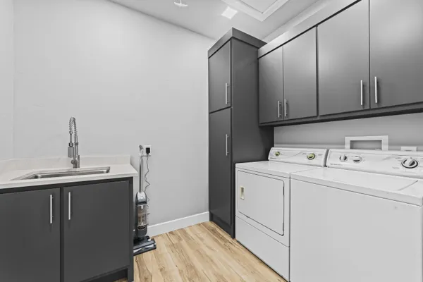 a utility room with dryer and washer