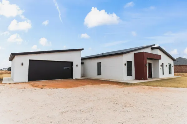 a view of a house with a outdoor space