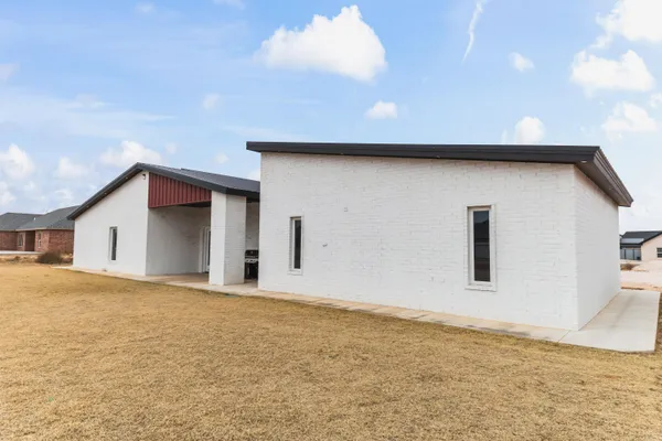 a house with yard and a space