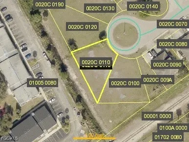 a view of a street with a building in the background