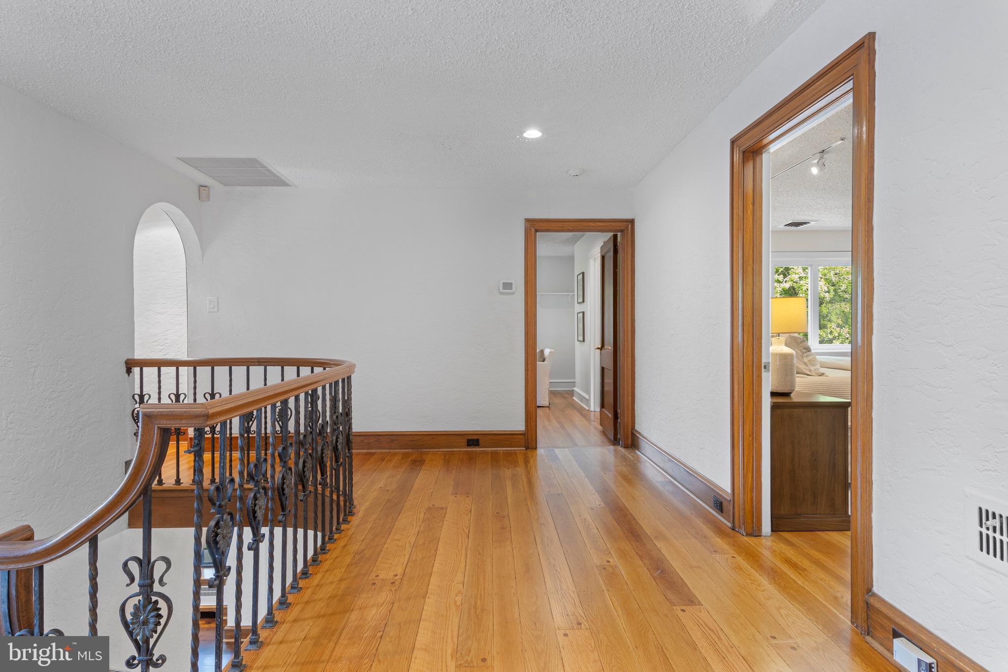 857 Meetinghouse Road Rydal, PA 19046 - Photo 33 of 93 a view of a hallway with wooden floor and staircase
