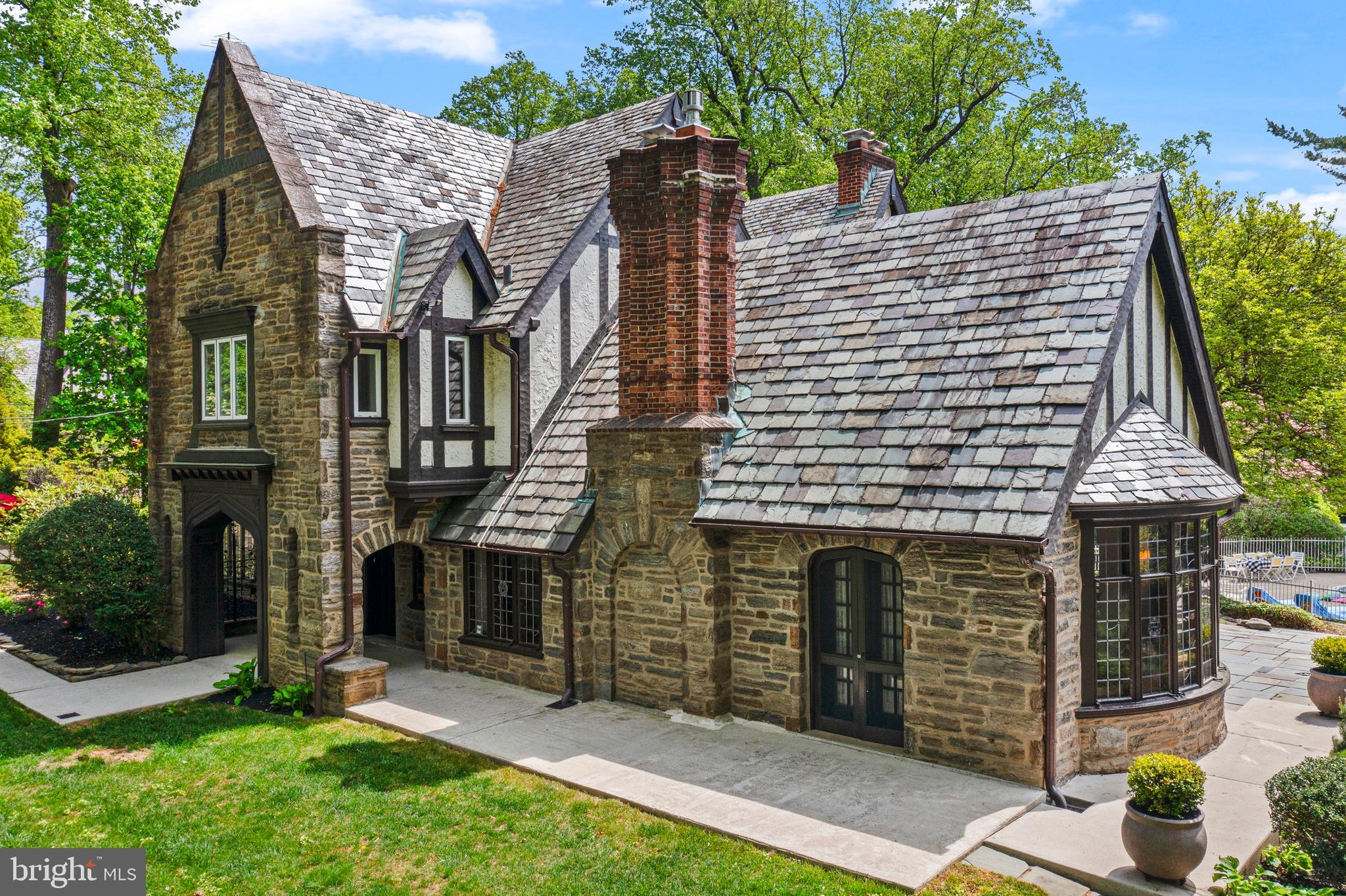 857 Meetinghouse Road Rydal, PA 19046 - Photo 4 of 93 a front view of a house with garden