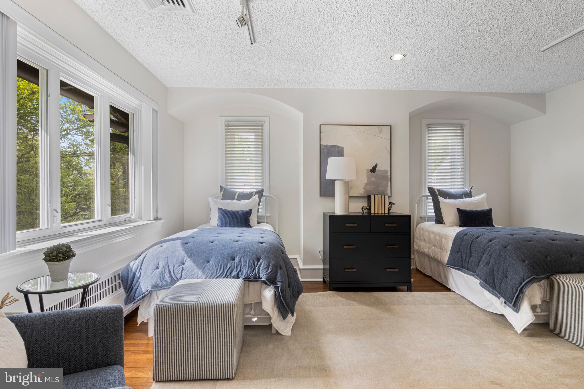 857 Meetinghouse Road Rydal, PA 19046 - Photo 43 of 93 a bedroom with a bed and wooden floor