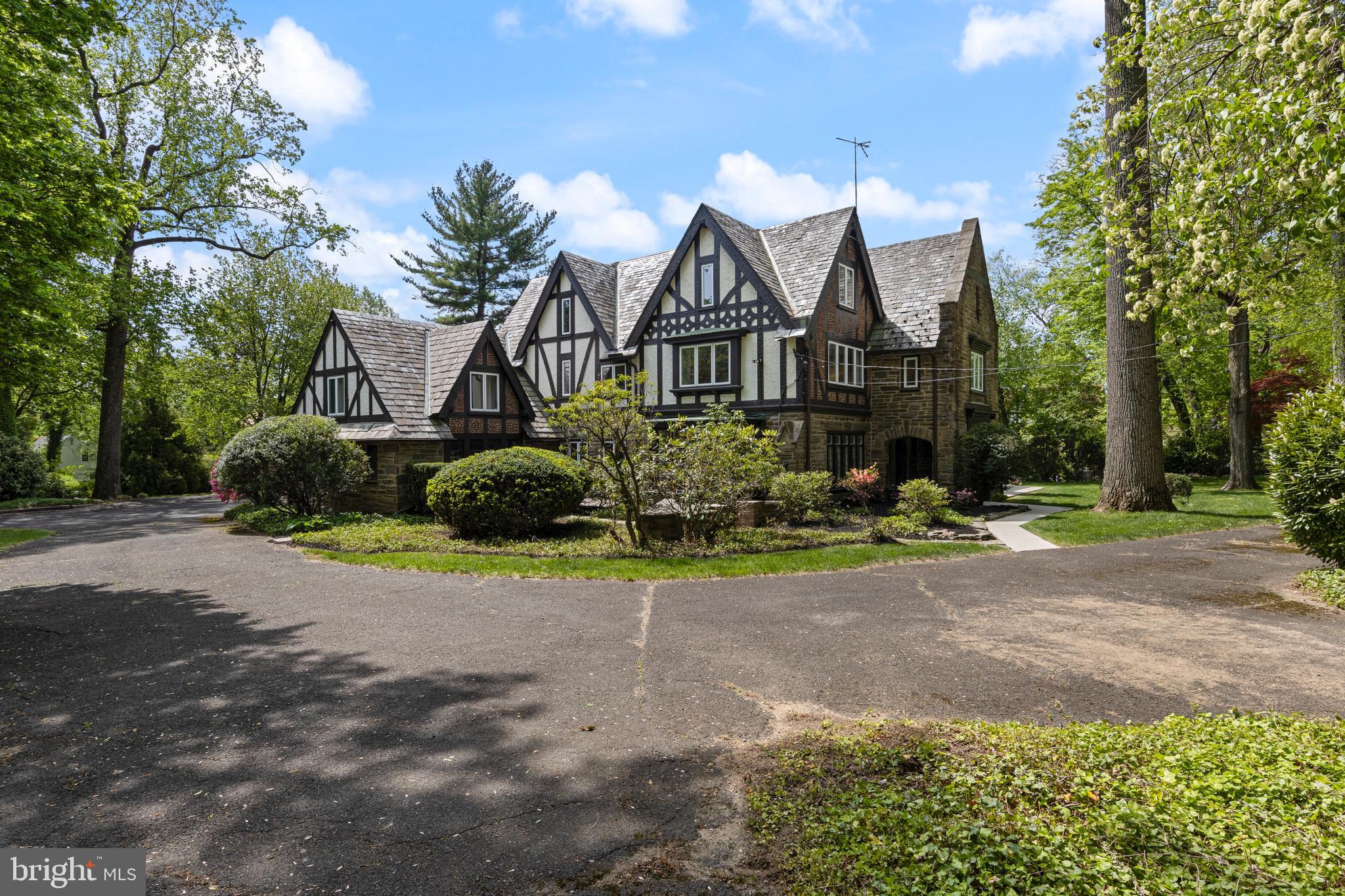 857 Meetinghouse Road Rydal, PA 19046 - Photo 74 of 93 a front view of a house with a yard and a garage