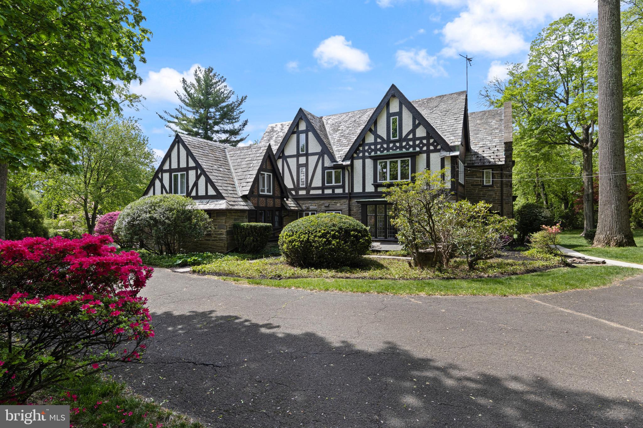857 Meetinghouse Road Rydal, PA 19046 - Photo 75 of 93 a front view of a house with a yard and garage