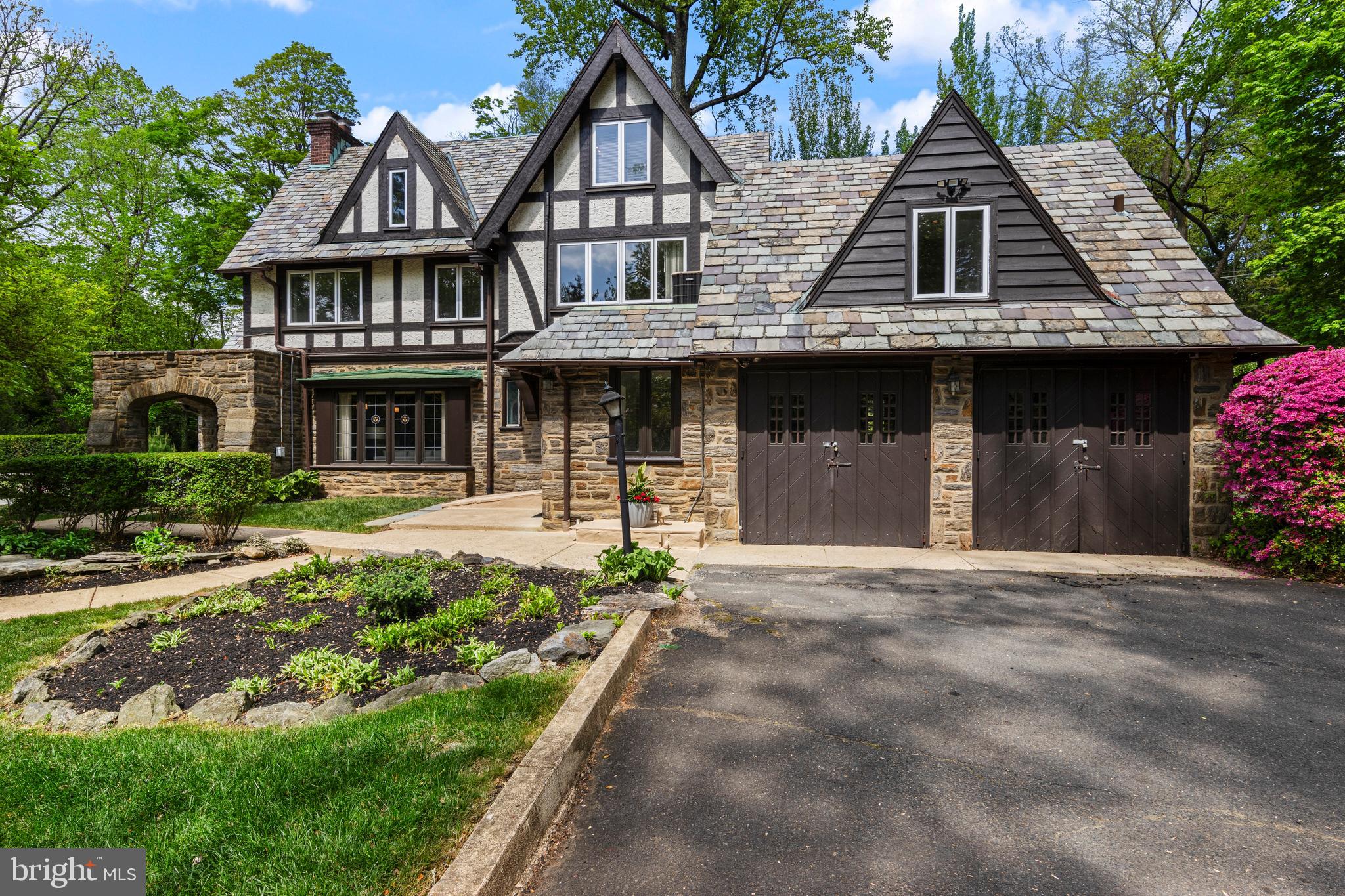 857 Meetinghouse Road Rydal, PA 19046 - Photo 78 of 93 a front view of a house with garden