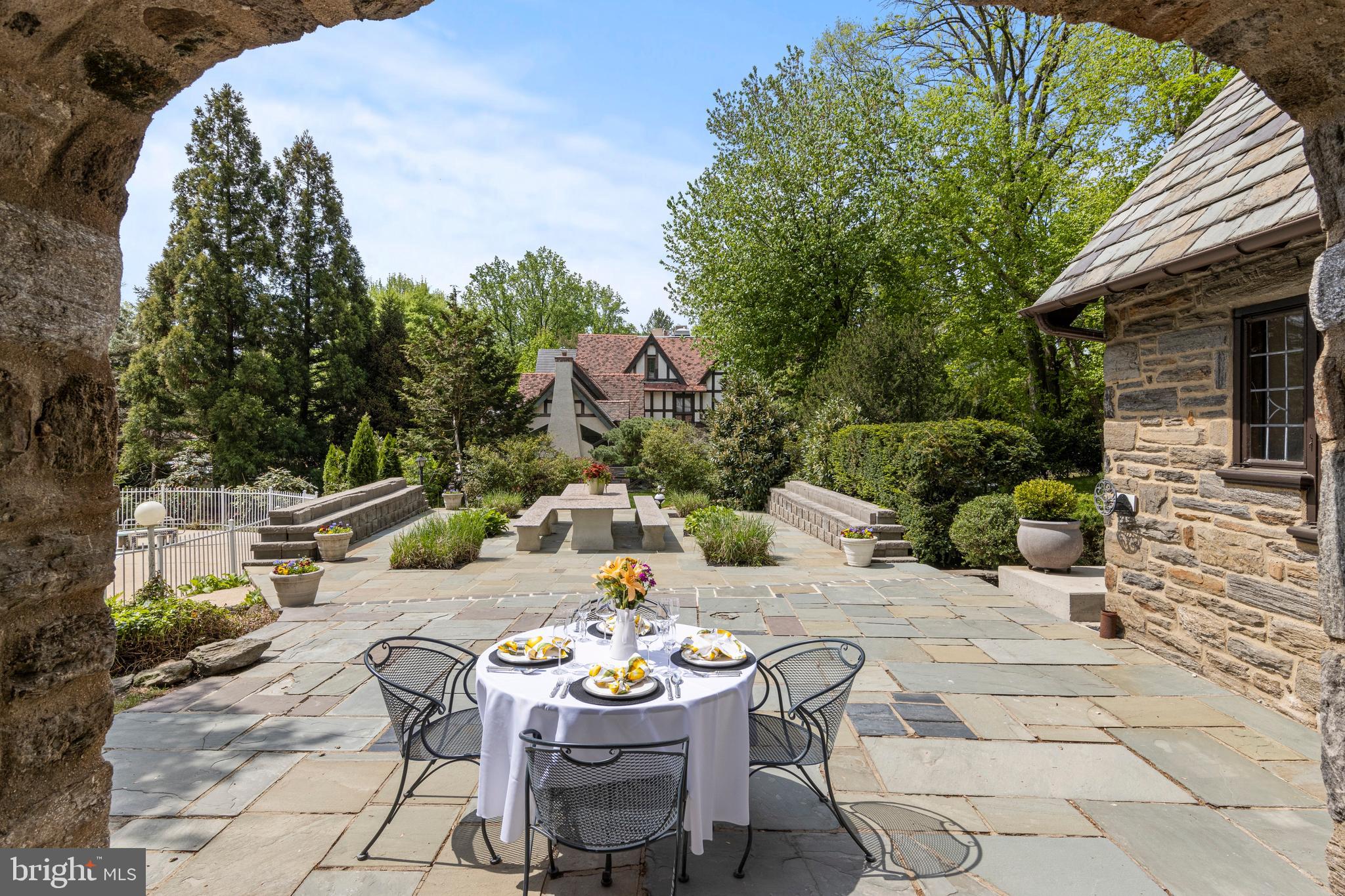 857 Meetinghouse Road Rydal, PA 19046 - Photo 84 of 93 a view of a chairs and table in backyard